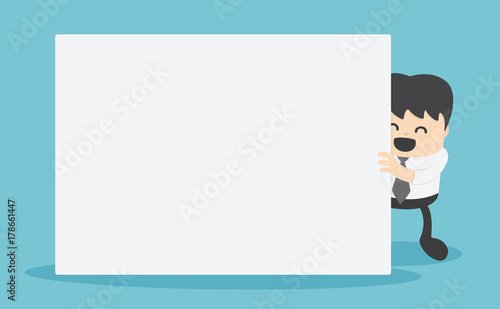 businessman with blank white banner. holding a blank banner isolated on background © wittaya