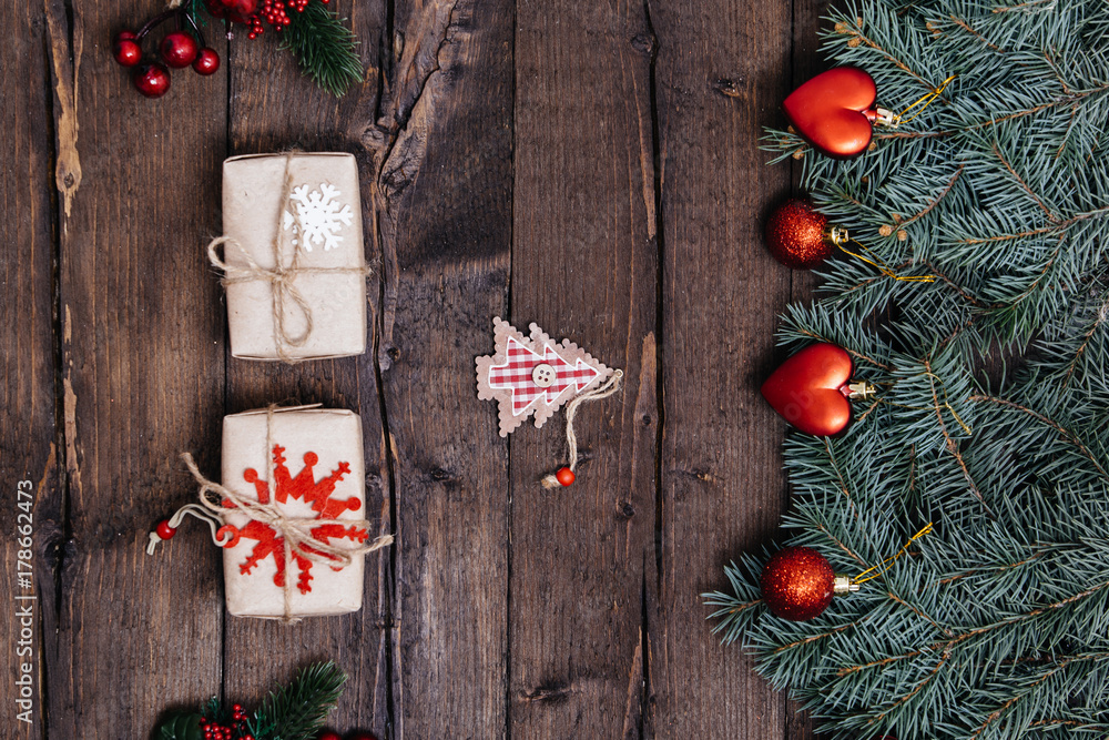 Christmas background with decorations, xmas tree and gift boxes on wooden board. Christmas background with decorations, xmas tree and gift boxes on wooden board.