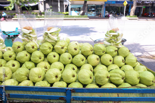 Fresh Kim Joo guava on a cart for sell at Pom Prap Sattru Phai Bangkok, Thailand photo