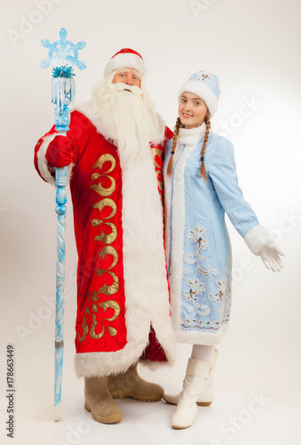 Santa Claus and Snow Maiden on a white background.