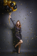 Exhilarated woman dancing at party