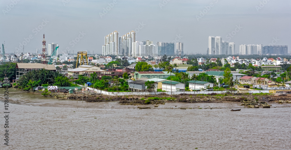 Naklejka premium Cityscape and river view of Ho Chi Minh City (Saigon). Vietnam, Southeast Asia