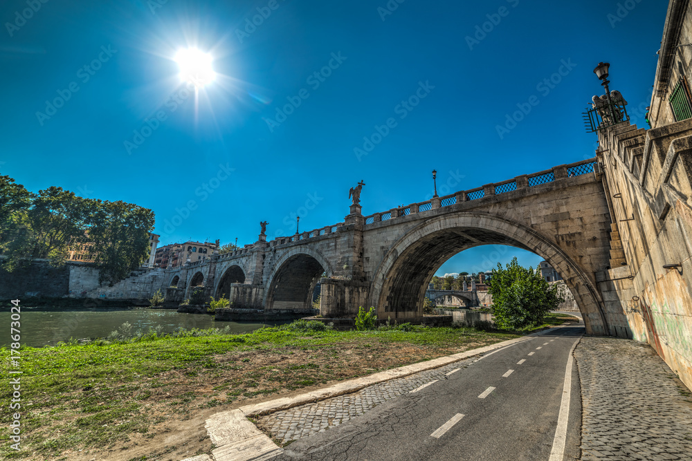 Ponte Sant'Angelo under a bright sun