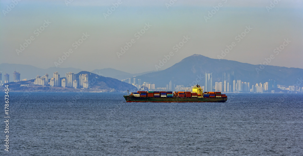 Container ship leaving Busan