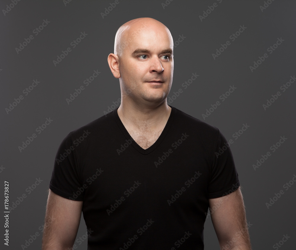 bald man in a T-shirt bald man in a T-shirt