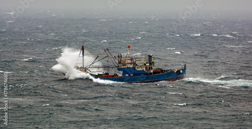 Fishing boat in rough weather