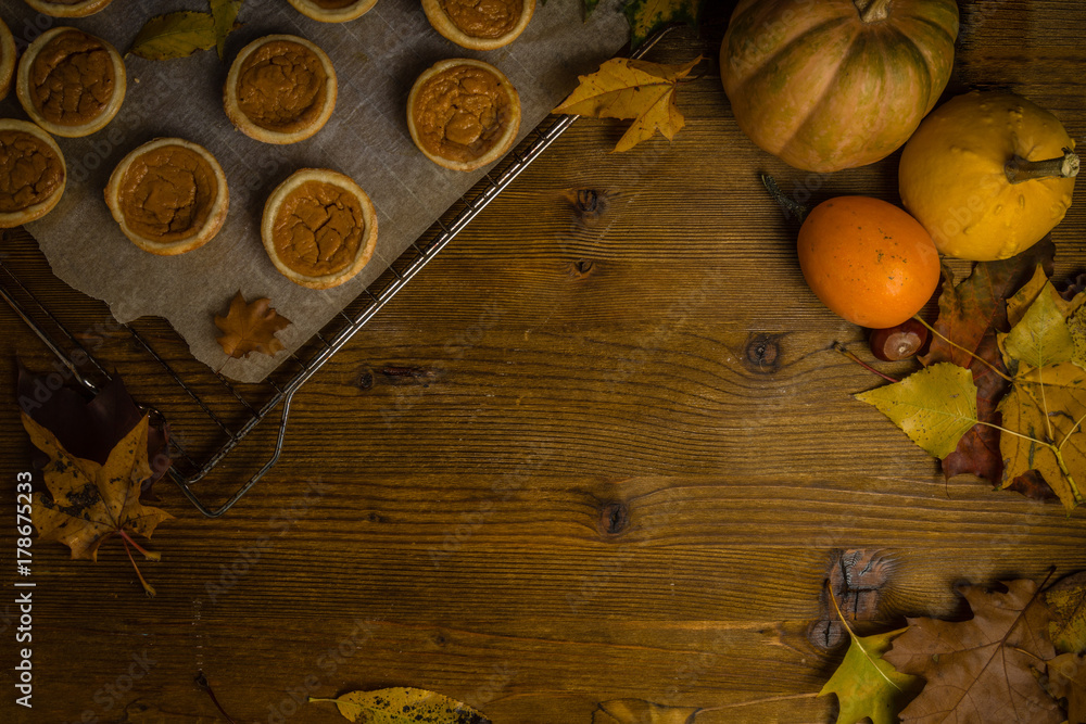 Fototapeta premium Thanksgiving concept - making mini pumpkin pies