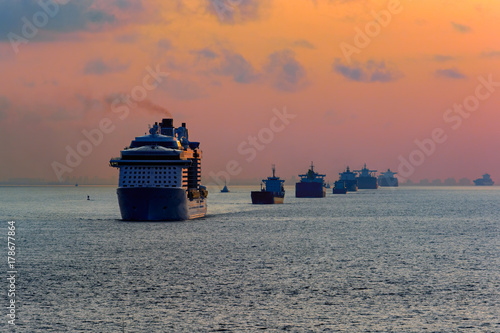 Various ships queue offshore approaching Shanghai.