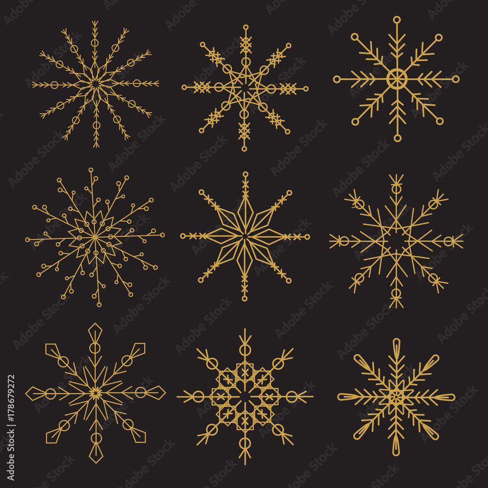 Geometric golden snowflakes on black background. New year, Christmas decorative icons Geometric golden snowflakes on black background. New year, Christmas decorative icons