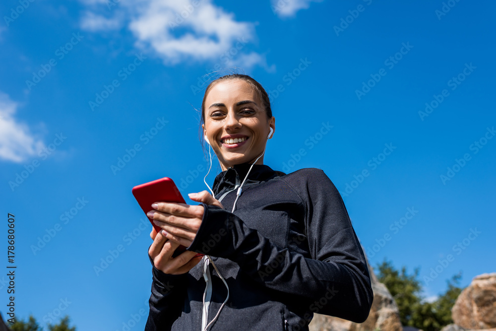 woman using smartphone woman using smartphone