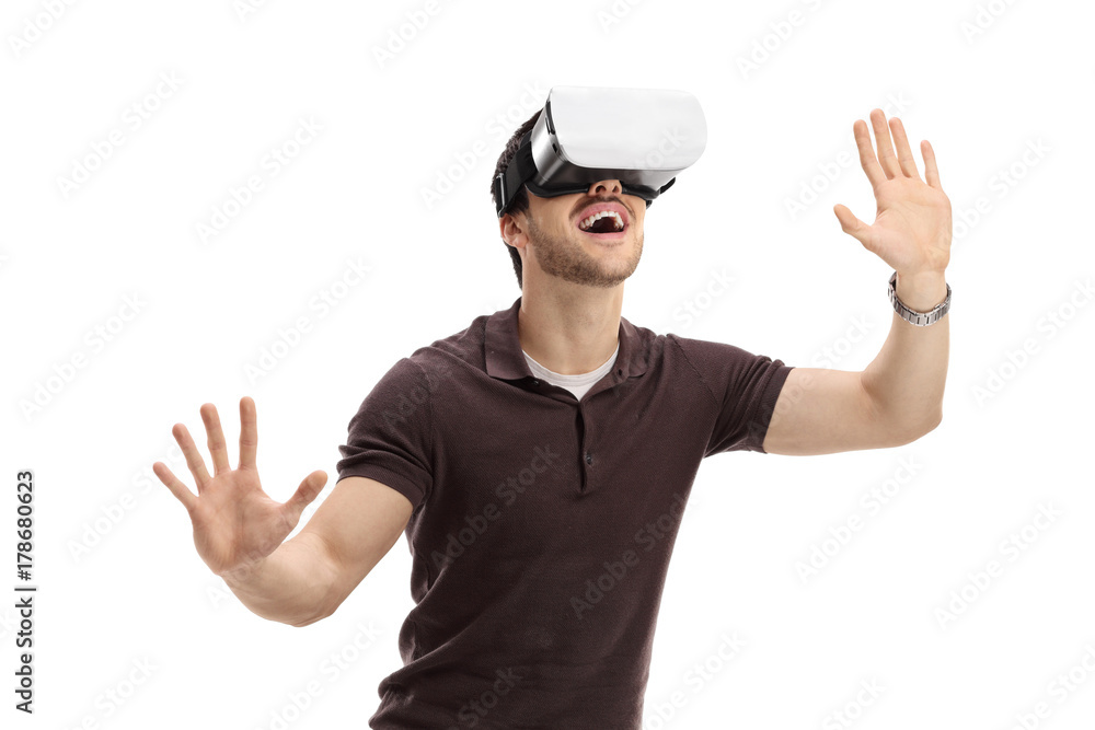 Amazed guy using a virtual reality headset Amazed guy using a virtual reality headset