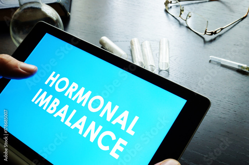 Photography Hormonal imbalance sign on a tablet.