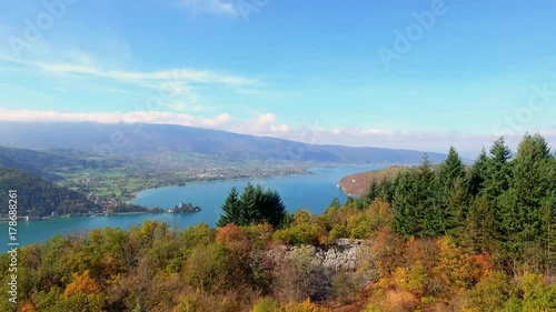 Stunning Drone footage over the French Alps, overlooking Lake Annecy and surrounding village, forests and mountains in the French Alps.