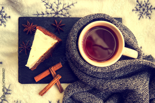 Tea with cake, cinnamon and anise photo