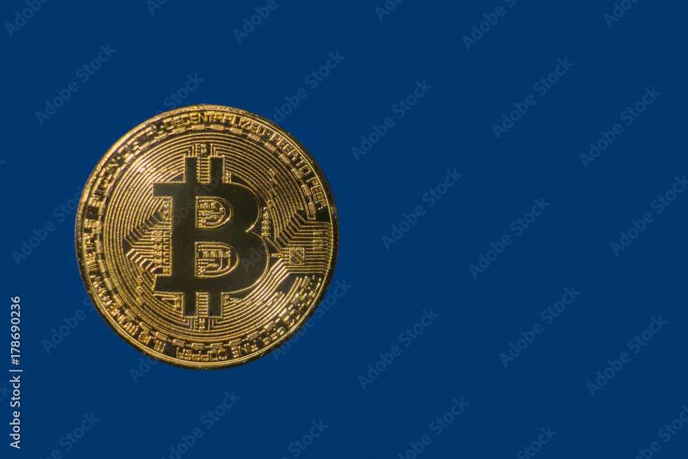 golden shiny coin bitcoin on a blue background golden shiny coin bitcoin on a blue background