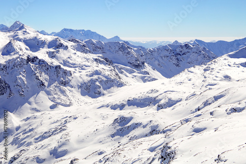 High mountains under snow in the winter. Slope on the skiing resort  European Alps