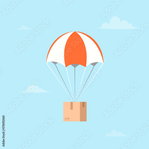 Package flying on parachute. Air shipping.