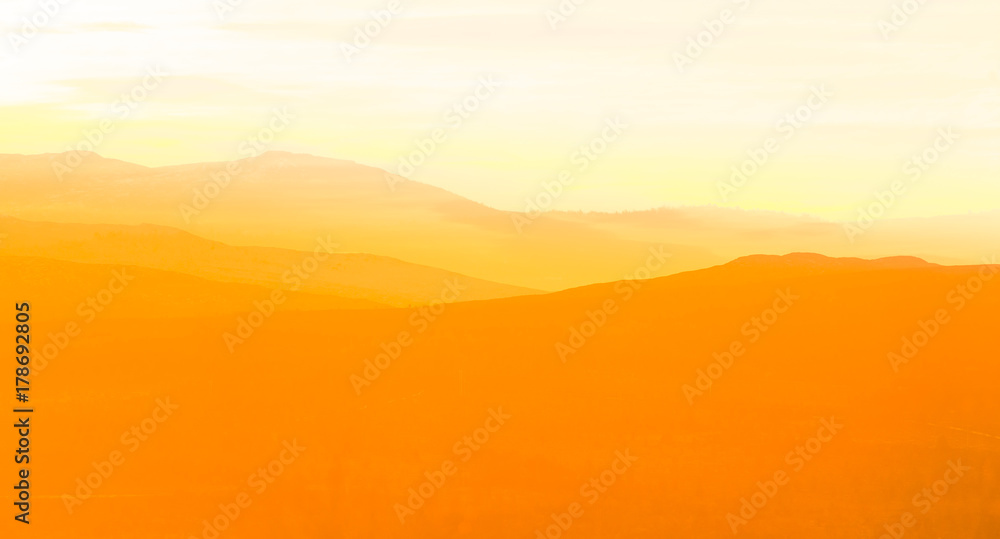 Beautiful, colorful autumn sunrise over the mountains in Norway. Abstract, colorful look.