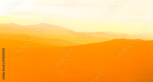 Beautiful, colorful autumn sunrise over the mountains in Norway. Abstract, colorful look.