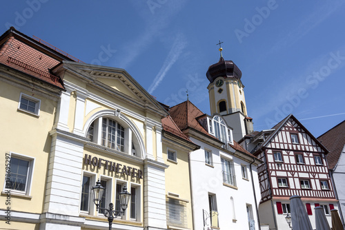 Germany, Sigmaringen, upper Danube: Steeple of old parish church St. John and Court Theater (Hoftheater) over the ancient city and blue sky in the background.