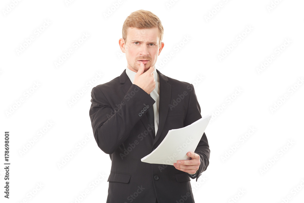 Portrait of young manager in black suit holding document on white background Portrait of young manager in black suit holding document on white background
