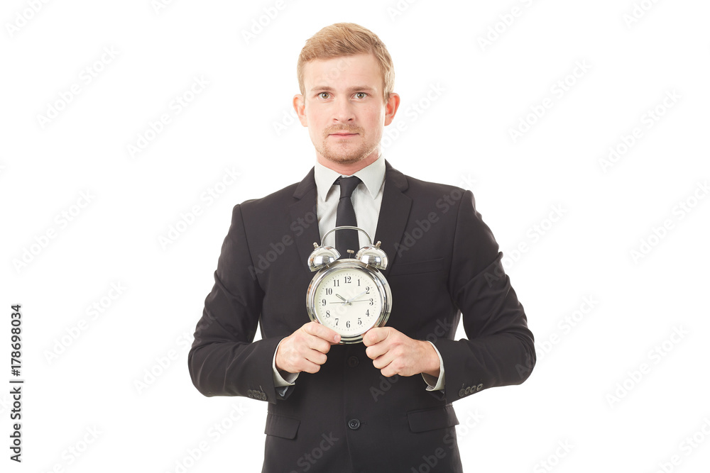 Portrait of young businessman with alarm clock on white background Portrait of young businessman with alarm clock on white background