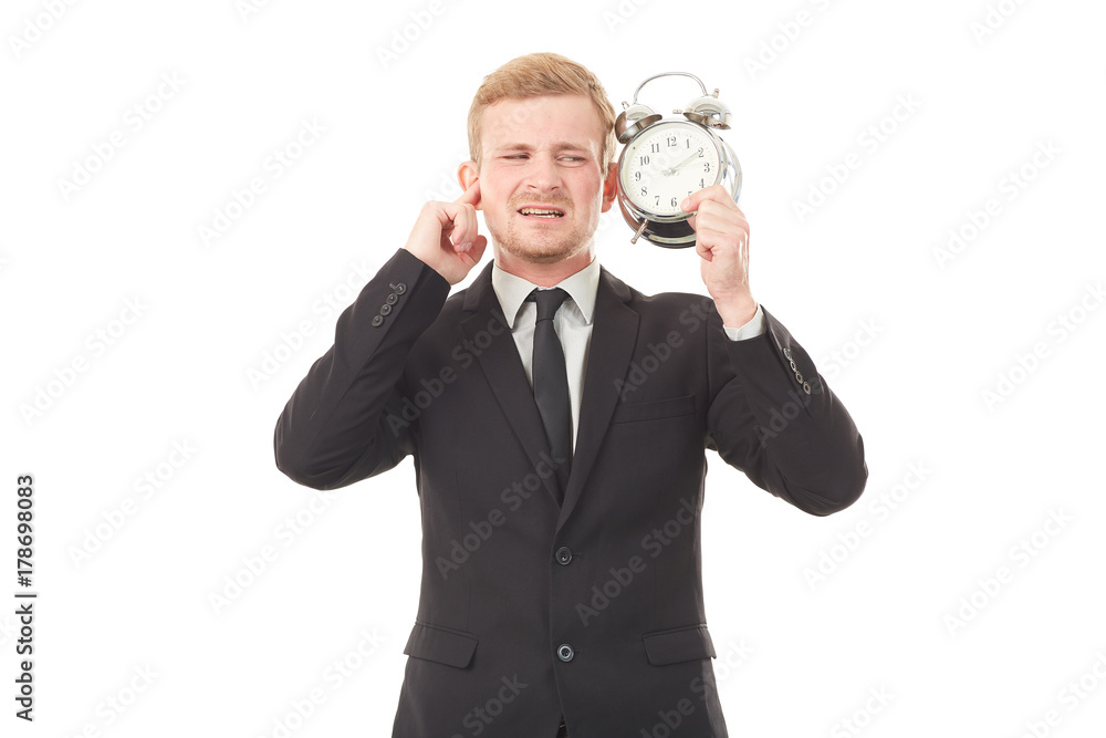Portrait of young businessman with alarm clock on white background Portrait of young businessman with alarm clock on white background