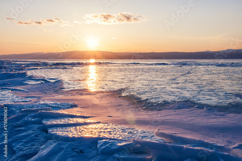Sunset on the lake Baikal in winter
