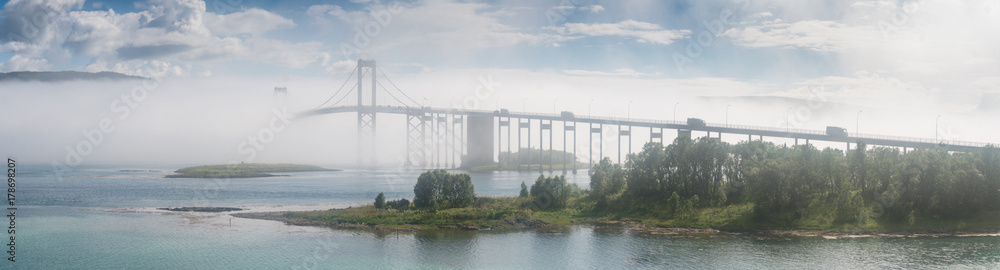 The Tjeldsund Bridge in the fog. Norway The Tjeldsund Bridge in the fog. Norway