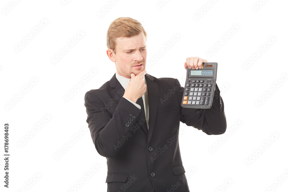 Portrait of businessman in black suit holding calculator Portrait of businessman in black suit holding calculator