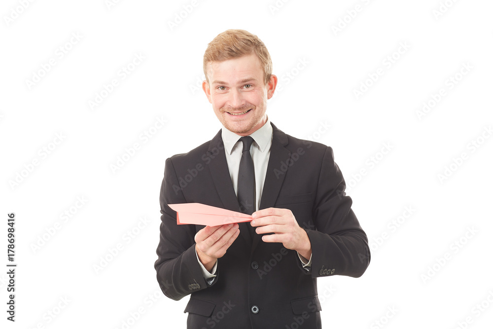 Portrait of businessman holding paper plane on white background Portrait of businessman holding paper plane on white background
