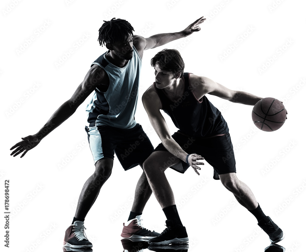 Fototapeta premium two basketball players men isolated in silhouette shadow on white background