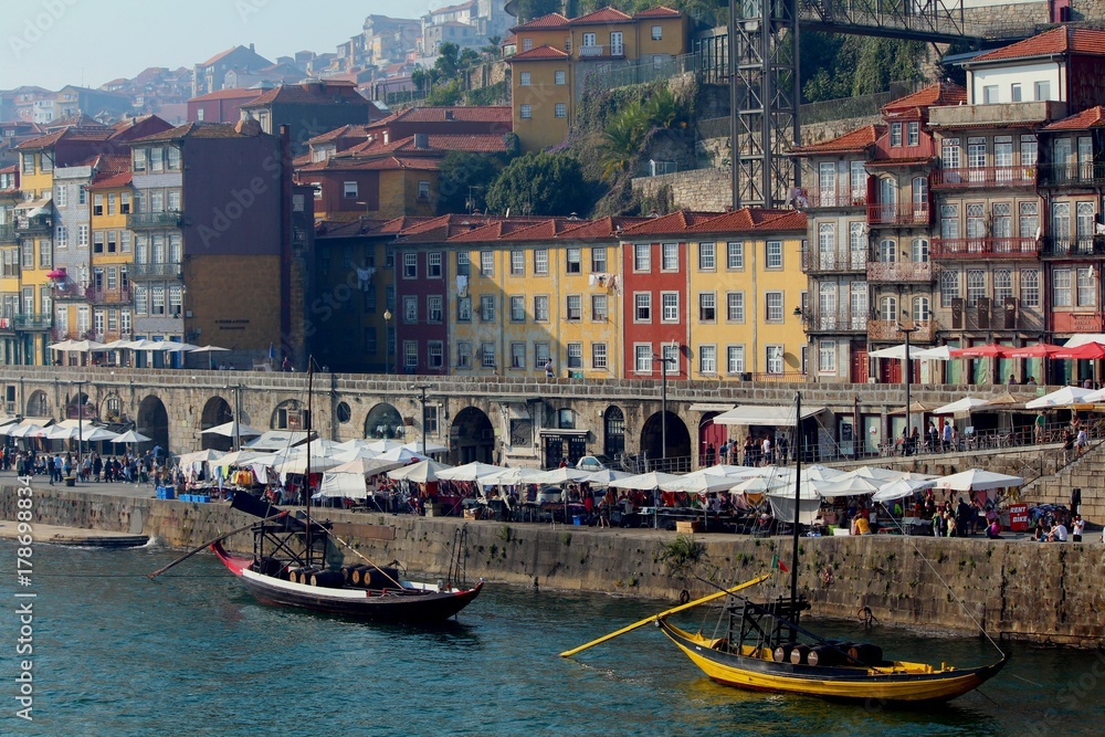 Ribeira and its beautiful houses and boats. The photo was taken while crossing the bottom deck of the Dom Luís I Bridge from Gaia to Porto.