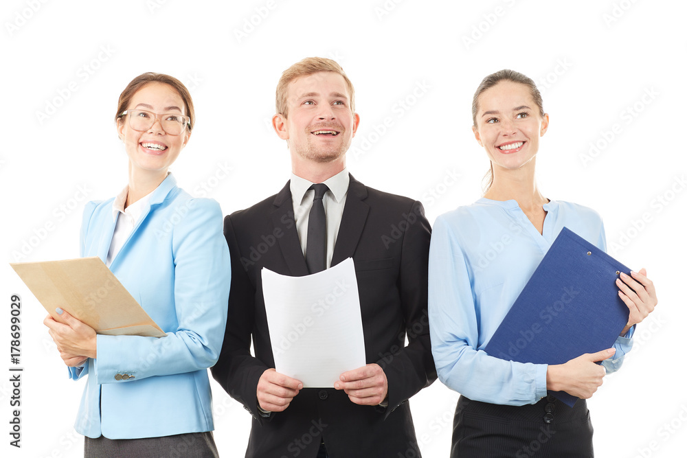 Portrait of young business team consisting of two women and man on white background Portrait of young business team consisting of two women and man on white background