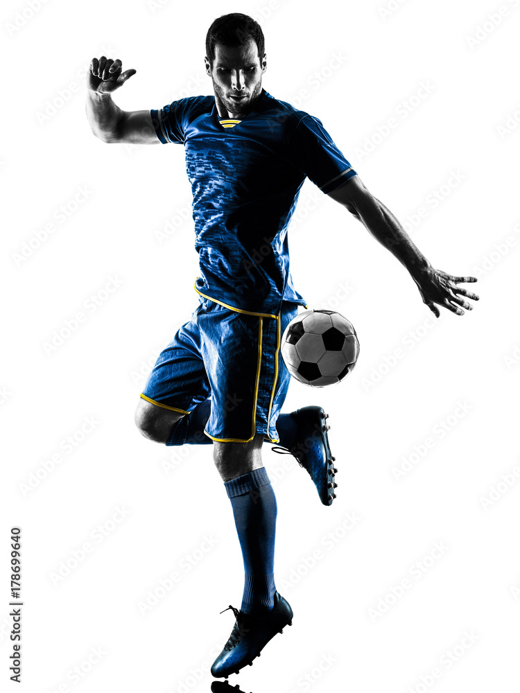 Fototapeta premium one caucasian soccer player man playing in silhouette isolated on white background