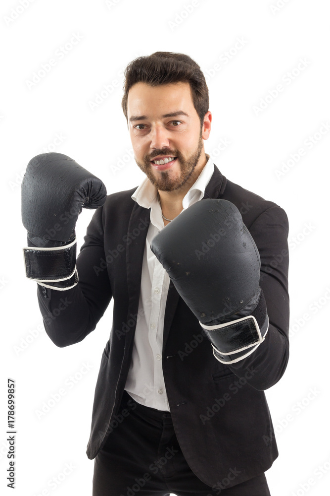 Man in a fighting position. bearded person wears black jacket and white shirt. Isolated.. Man in a fighting position. bearded person wears black jacket and white shirt. Isolated..