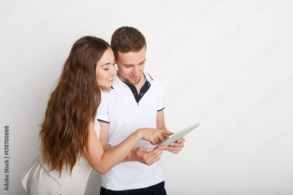 Couple shopping online with digital tablet Couple shopping online with digital tablet