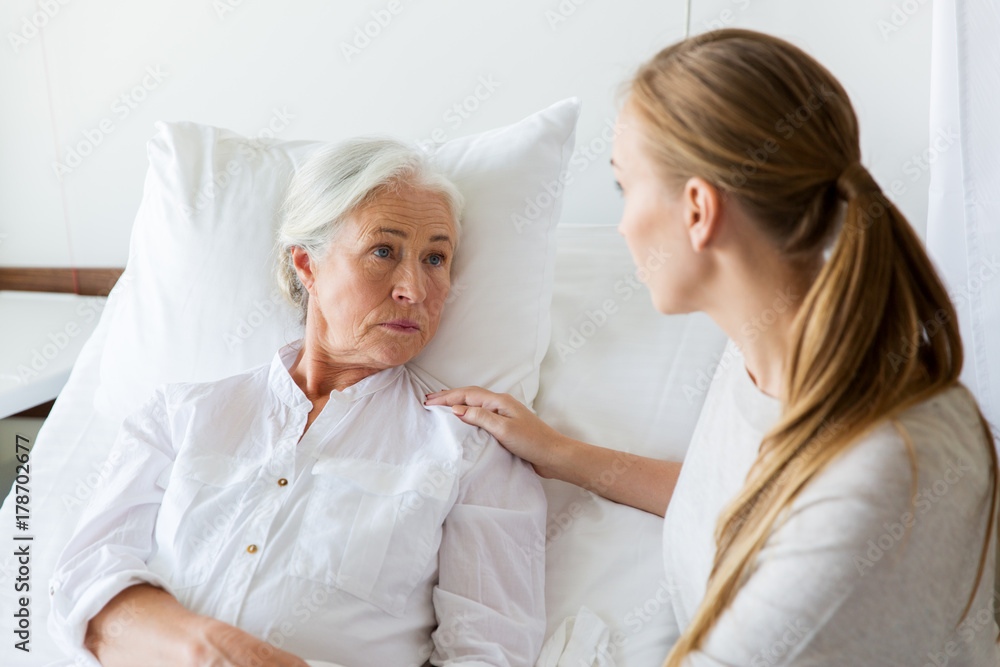 Fototapeta premium daughter visiting her senior mother at hospital