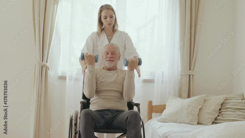 Health visitor and a senior man during home visit. Health visitor and a senior man during home visit.