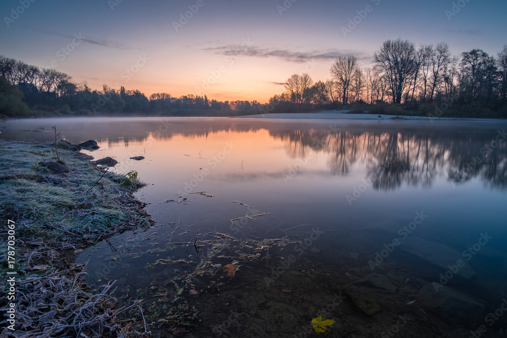 Frosty dawn at river
