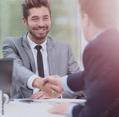 Wallpaper Mural Business handshake. Two business people shaking hands in office. Torontodigital.ca