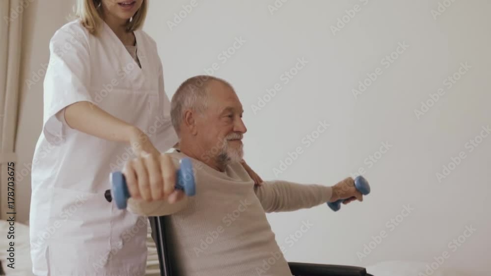 Health visitor and a senior man during home visit. Health visitor and a senior man during home visit.