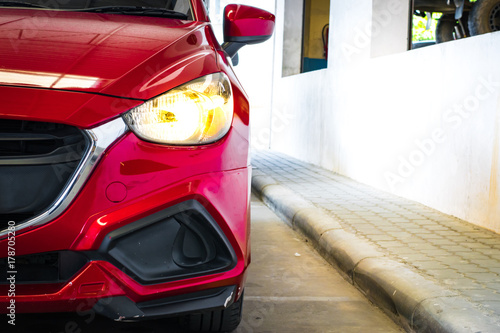 Fotografija BANGSAN, THAILAND - OCTOBER, 13, 2017 :  Led headlight car mazda brand japan parked in showroom of thailand for customers