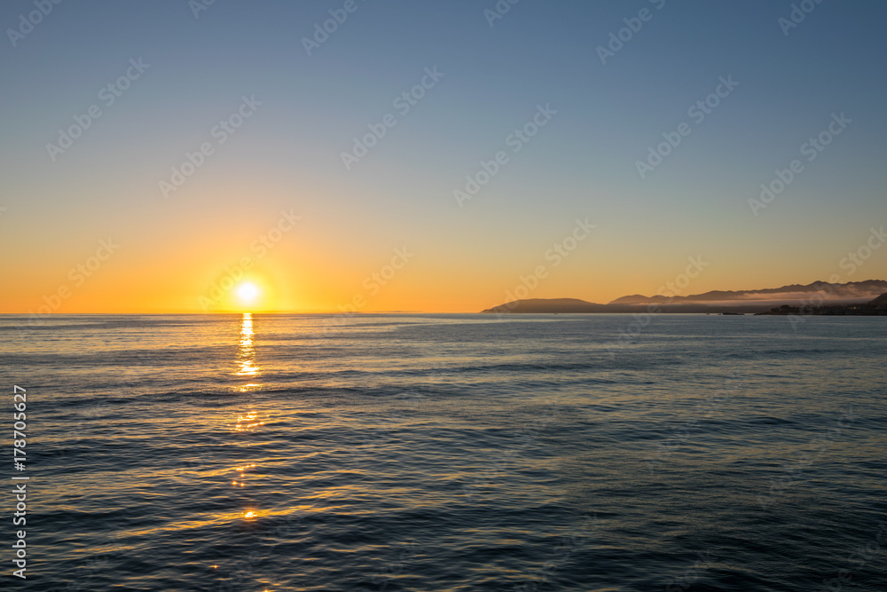 Waiting for the Sun to set at Pismo Beach, Oceano Dunes Natural Preserve, California, USA