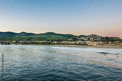 Waiting for the Sun to set at Pismo Beach, Oceano Dunes Natural Preserve, California, USA