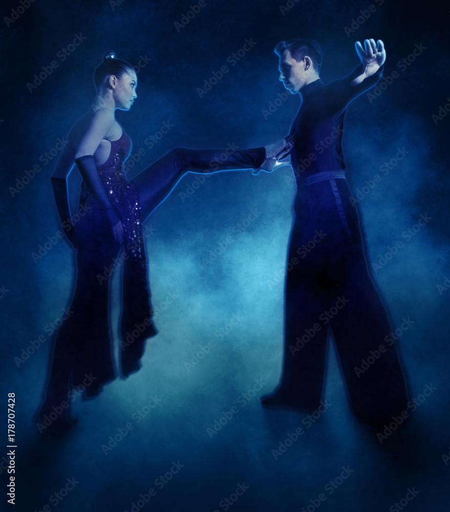 Pair of dancers dancing ballroom