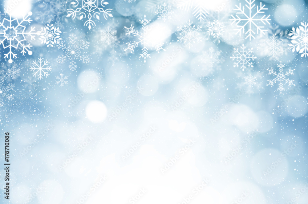 Christmas and New year background. Blue blurred abstract background with snowflake. Christmas and New year background. Blue blurred abstract background with snowflake.