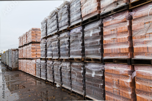 Red bricks stacked into cubes