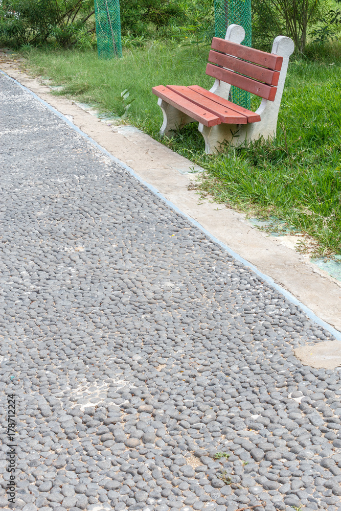 Man made pebble stone path. Multiple pebble stones laid for people to walk. Man made pebble stone path. Multiple pebble stones laid for people to walk.