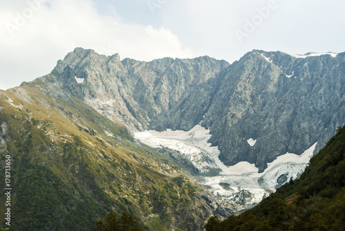View of a melting glacier in a mountain valley